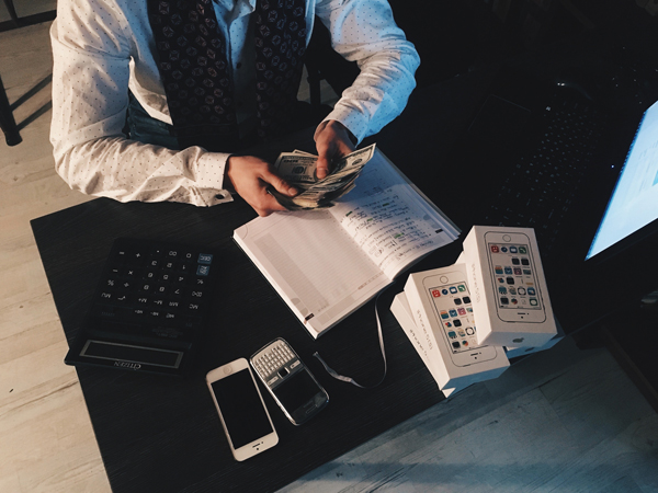 Businessman counting finances